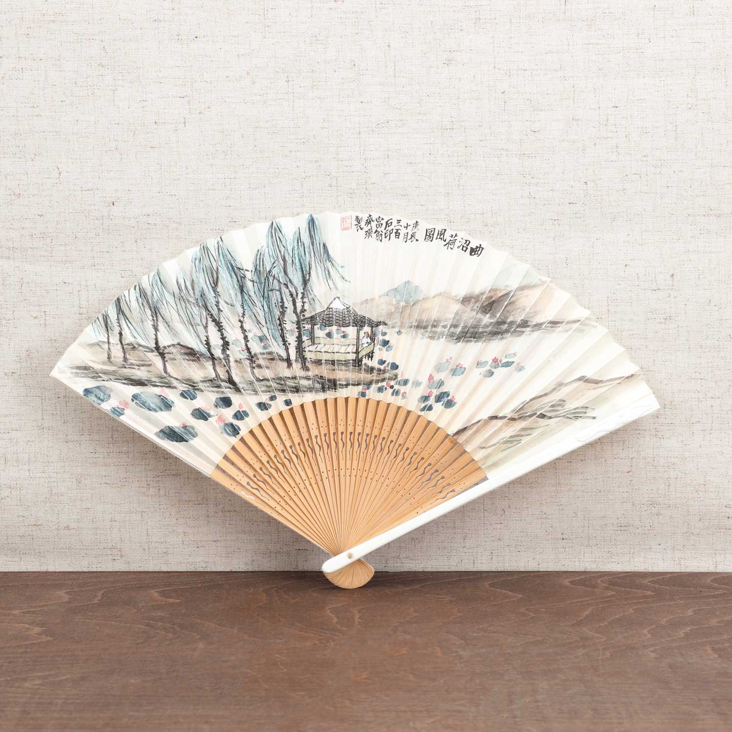 Lot 376 - A Chinese brisé fan