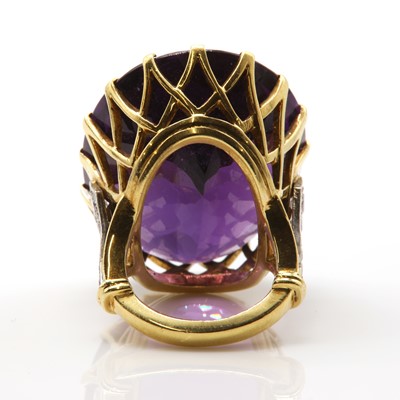 Lot 199 - An 18ct gold single stone amethyst ring with diamond set shoulders, c.1970