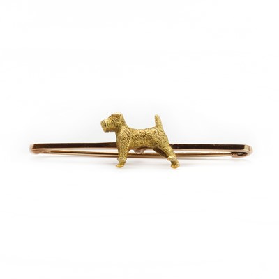 Lot 99 - A gold fox terrier bar brooch