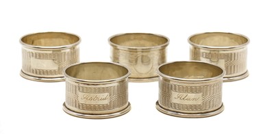 Lot 23 - A set of four silver napkin rings
