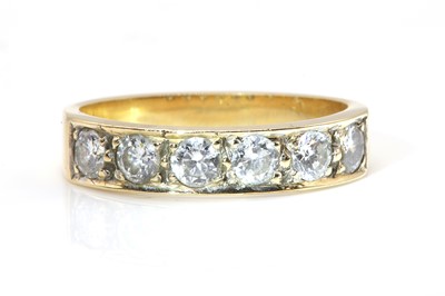 Lot 279 - A six stone diamond half eternity ring