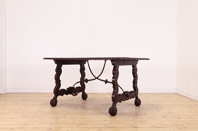 Lot 579 - A walnut centre table