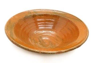 Lot 264 - A large French slipware terracotta bloodletting bowl