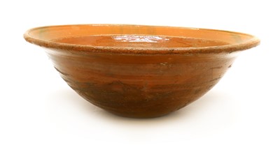 Lot 264 - A large French slipware terracotta bloodletting bowl