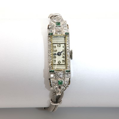 Lot 150 - An Art Deco emerald and diamond set mechanical cocktail watch, c.1925