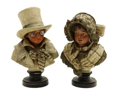 Lot 100 - A pair of Austrian painted terracotta novelty busts of children