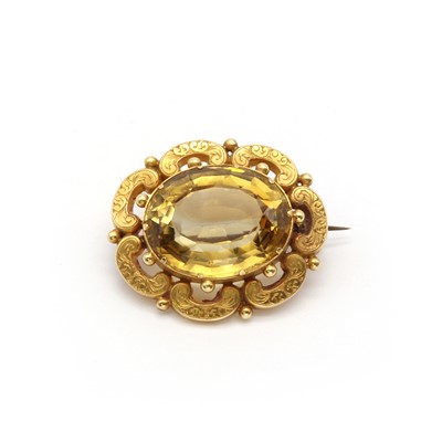 Lot 10 - A gold citrine brooch