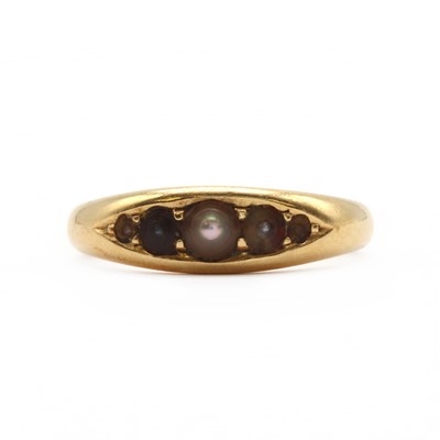 Lot 16 - An 18ct gold five stone split pearl ring