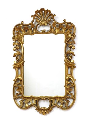 Lot 345 - A Rococo style gilt mirror