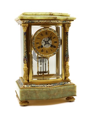 Lot 167 - A French Champlevé enamel and onyx mantel clock