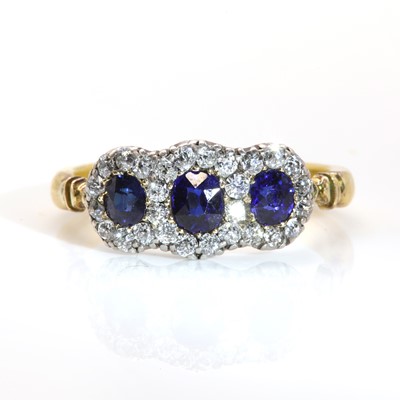 Lot 88 - An Edwardian sapphire and diamond triple cluster ring