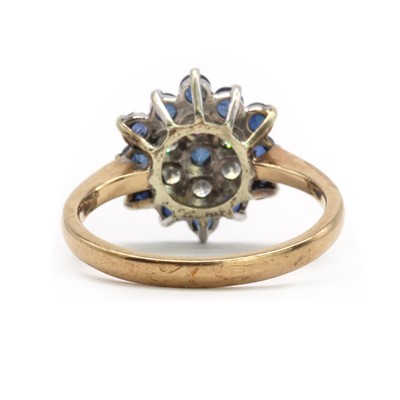Lot 109 - A 9ct gold sapphire and diamond target cluster ring