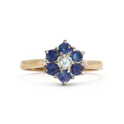 Lot 110 - A 9ct gold sapphire and diamond floral cluster ring