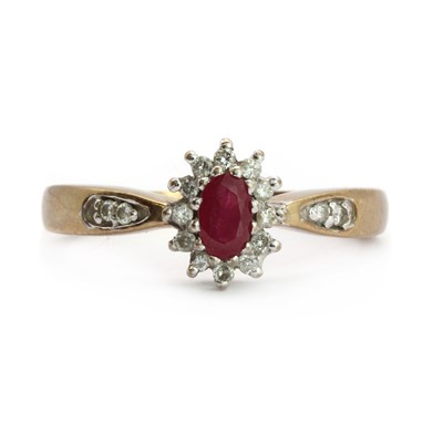 Lot 61 - A 9ct gold ruby and diamond cluster ring