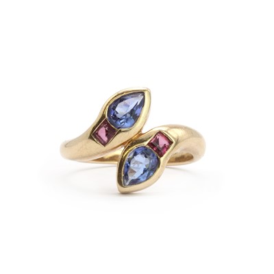 Lot 126 - A 9ct gold tanzanite and garnet twin snake ring