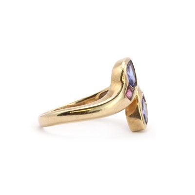Lot 126 - A 9ct gold tanzanite and garnet twin snake ring