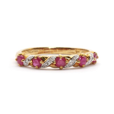 Lot 59 - A 9ct gold ruby and diamond half eternity ring