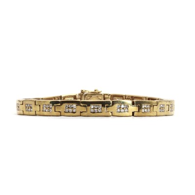 Lot 47 - A 9ct gold diamond panel bracelet