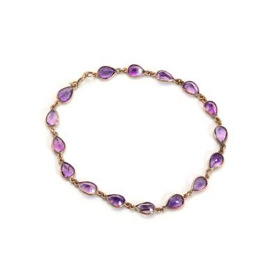 Lot 137 - A gold and amethyst line bracelet