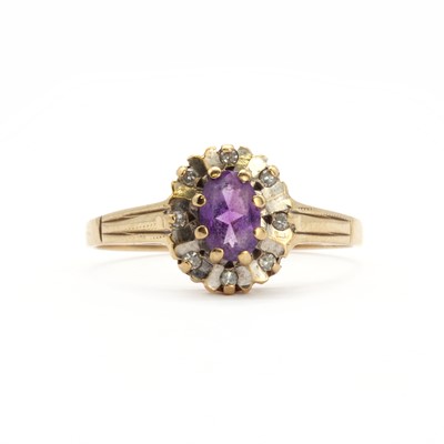 Lot 133 - A 9ct gold amethyst and diamond cluster ring