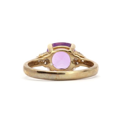 Lot 130 - A 9ct gold amethyst and diamond ring