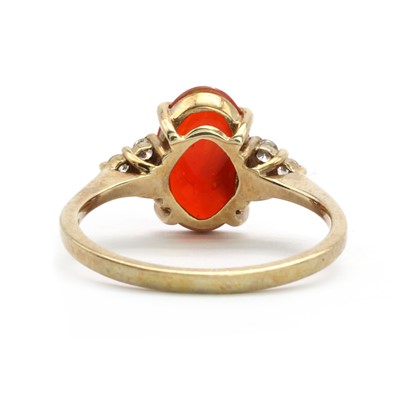 Lot 144 - A 9ct gold single stone fire opal ring