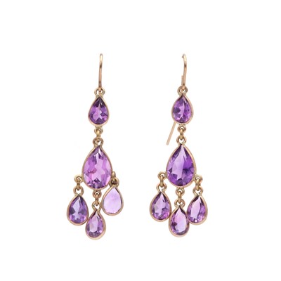 Lot 144 - A pair of gold and amethyst drop earrings