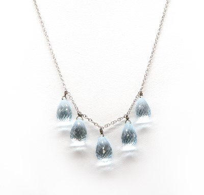 Lot 456 - An 18ct white gold blue topaz necklace