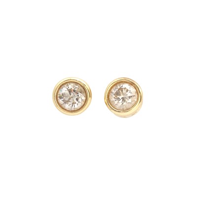 Lot 80 - A pair of single stone diamond stud earrings