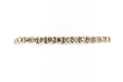Lot 201 - A diamond set line bracelet
