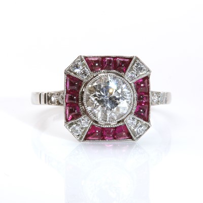 Lot 323 - An Art Deco style diamond and ruby octagonal cluster ring