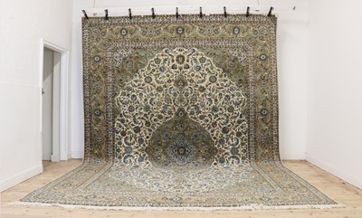 Lot 270 - A large Kashan carpet