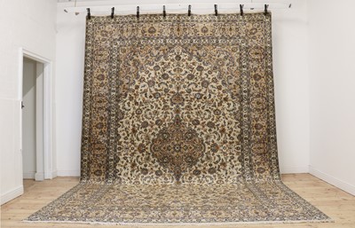 Lot 284 - A large Kashan carpet