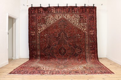 Lot 287 - A large Heriz carpet