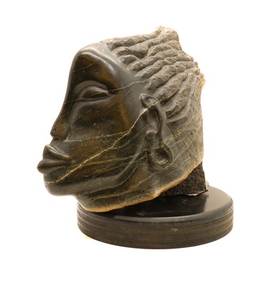 Lot 175 - A carved hardstone head