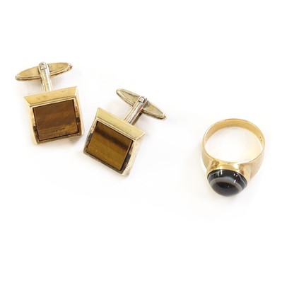 Lot 251 - A pair of gold plated tiger's eye Dunhill cufflinks