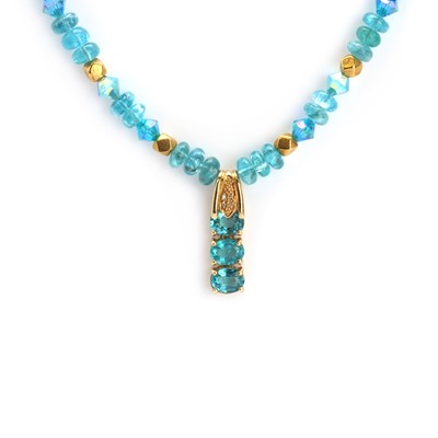 Lot 112 - An 18ct gold blue apatite bead necklace