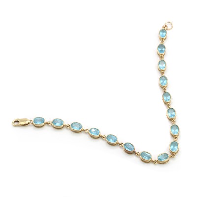 Lot 123 - A gold and topaz line bracelet