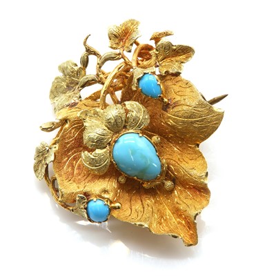 Lot 10 - An early Victorian two colour gold turquoise set leaf brooch, c.1840