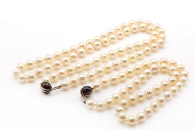 Lot 234 - Two single rows of uniform cultured pearls