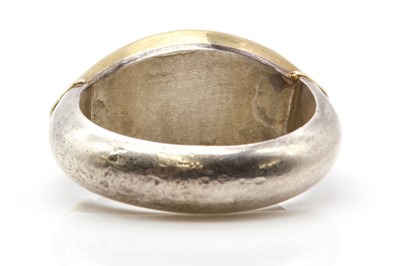 Lot 145 - A sterling silver and gold mixed metal tourmaline ring, by Patricia Jean Hamilton