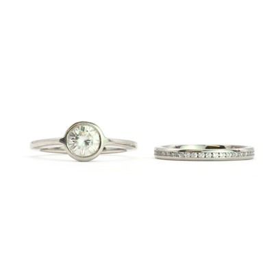 Lot 200 - A platinum and synthetic moissanite ring