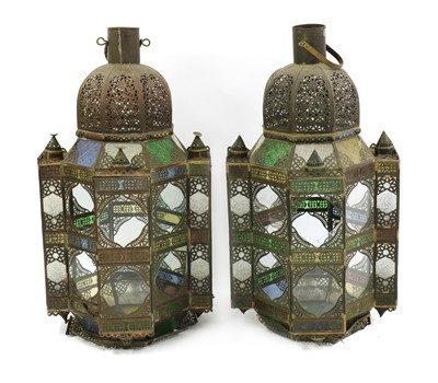 Lot 385 - A pair of large pierced brass lanterns