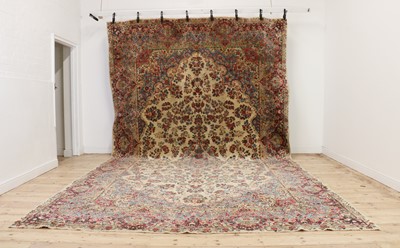 Lot 384 - A large Kirman carpet