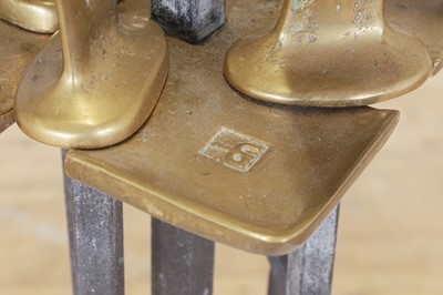 Lot 112 - A set of modernist brass fire tools