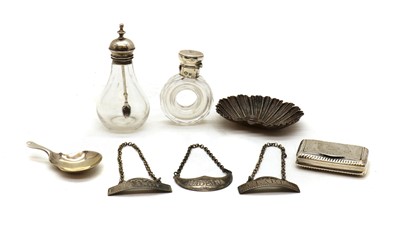 Lot 14 - A cut glass and silver mounted scent bottle