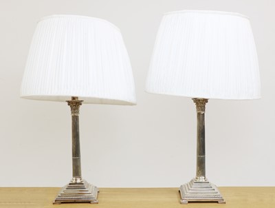 Lot 277 - A pair of silver-plated table lamps