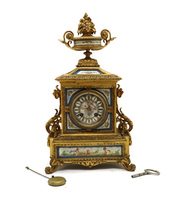 Lot 172 - A French Louis XVI style gilt cased mantle clock