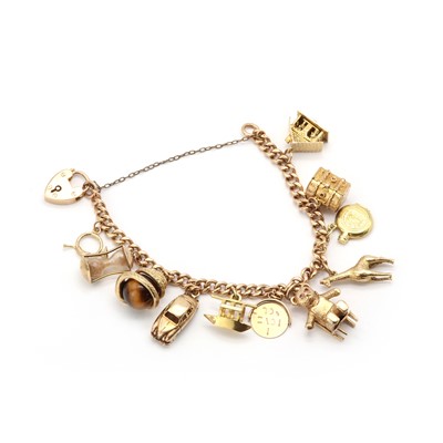 Lot 177 - A 9ct gold charm bracelet