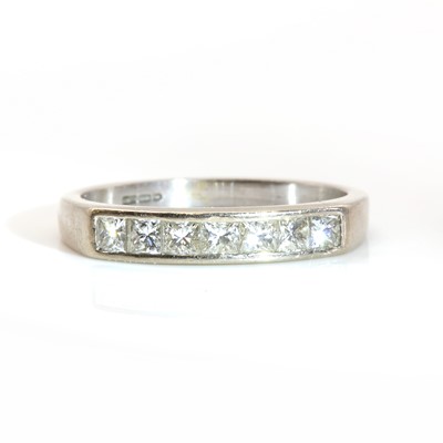 Lot 308 - An 18ct white gold diamond set half eternity ring